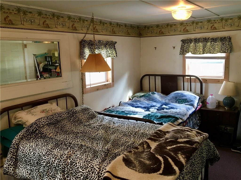 662 Bean Farm Road Sheffield, PA 16347 - Photo 11 of 21 Second Bedroom, has three beds that are also included in sale of the property