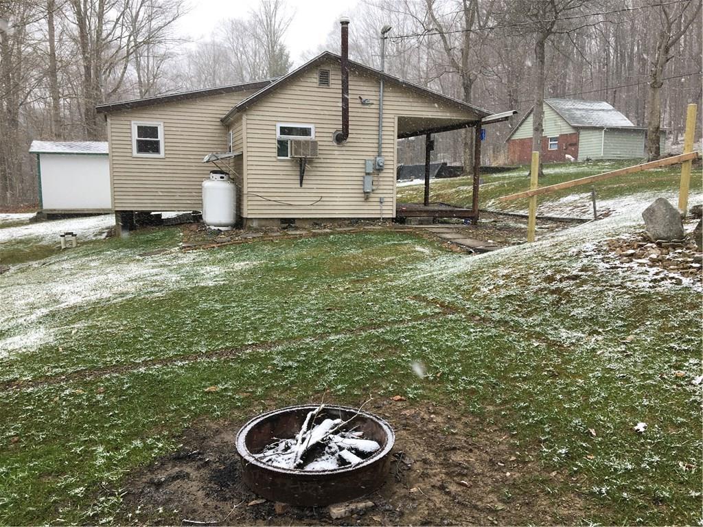 662 Bean Farm Road Sheffield, PA 16347 - Photo 17 of 21 View of Fire pit in the yard