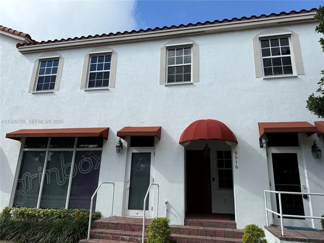a couple of table and chair in the house
