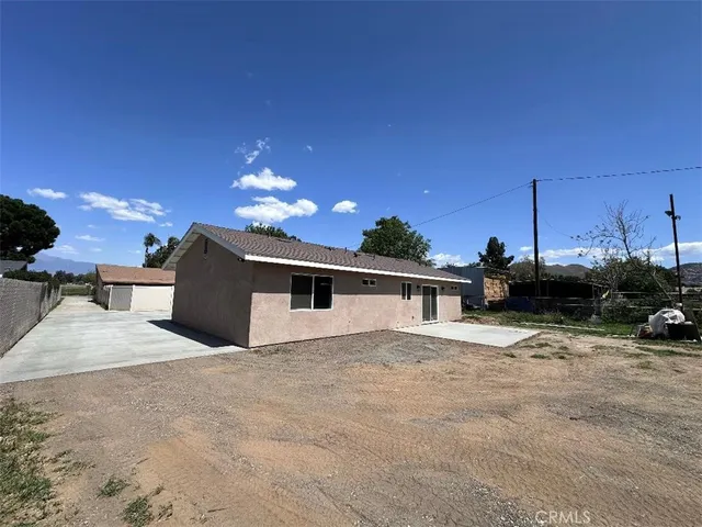 a view of a house with a patio