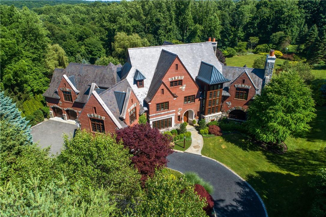 an aerial view of a house with a garden