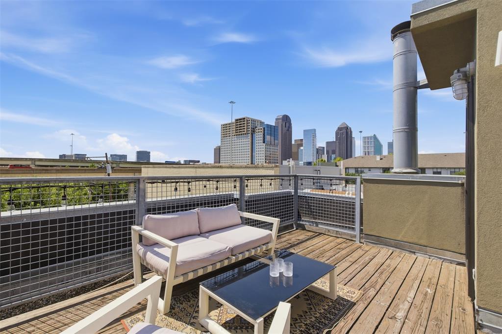 2111 Clark Street, Unit H Dallas, TX 75204 - Photo 18 of 37 a view of a terrace with seating space