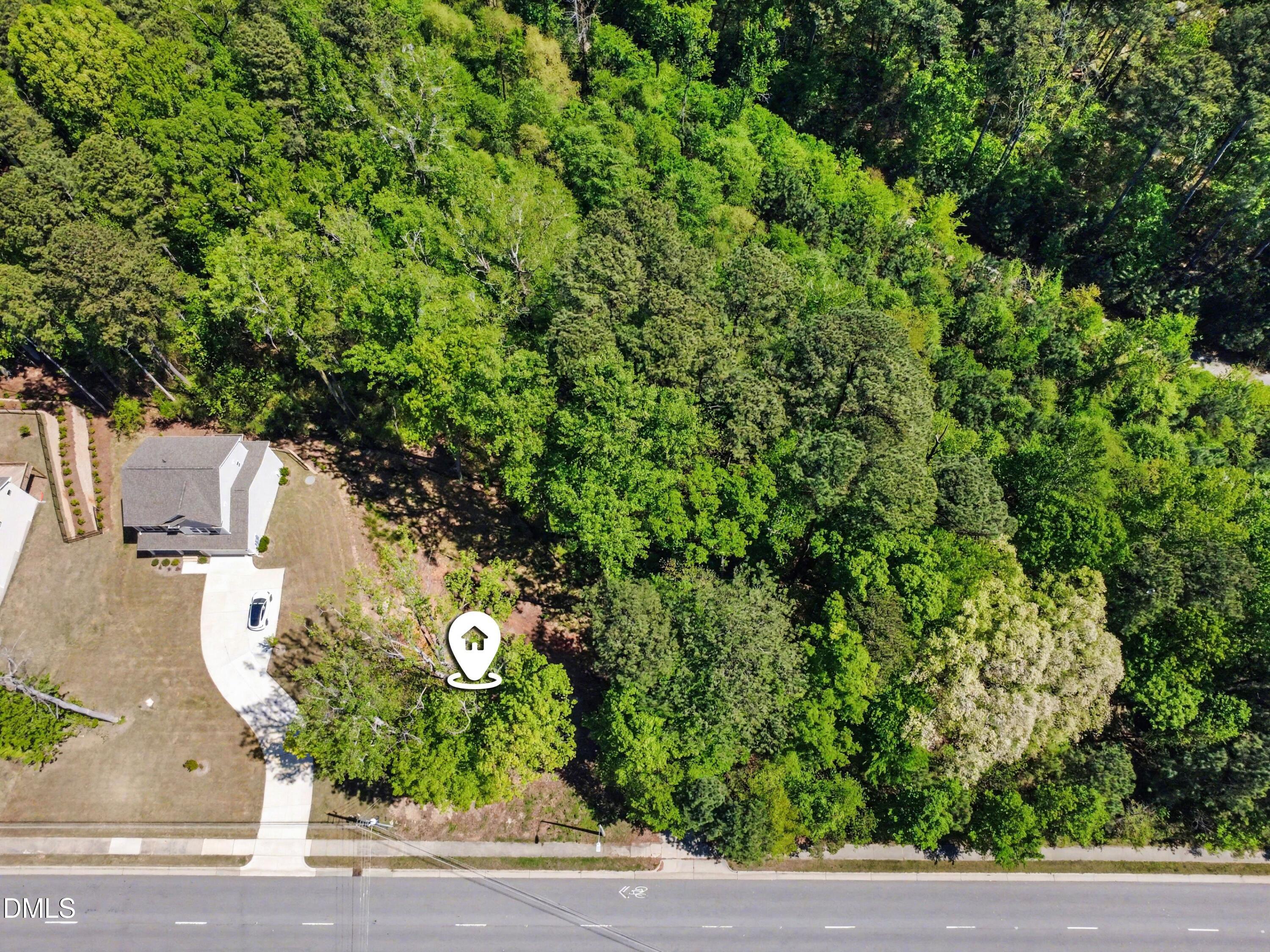 810 Southwest Maynard Road Cary, NC 27511 - Photo 14 of 14 an aerial view of a house with yard