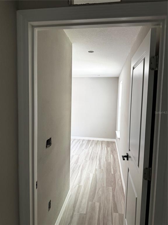 101 Grove Street Orlando, FL 32835 - Photo 25 of 57 a view of a room with wooden floor and staircase