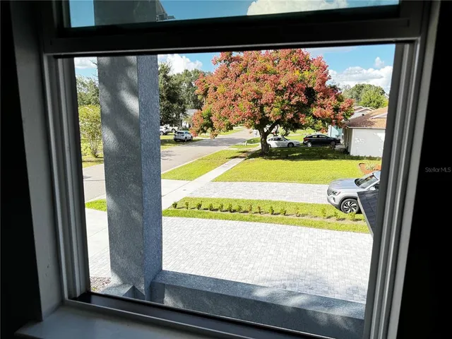 a white toilet sitting next to a bath tub and a shower