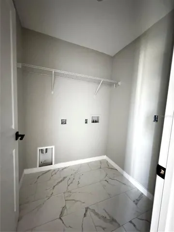 a view of a porch with wooden floor