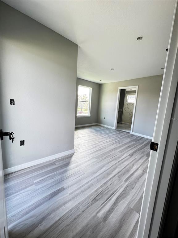 101 Grove Street Orlando, FL 32835 - Photo 33 of 57 a view of a room with wooden floor and window