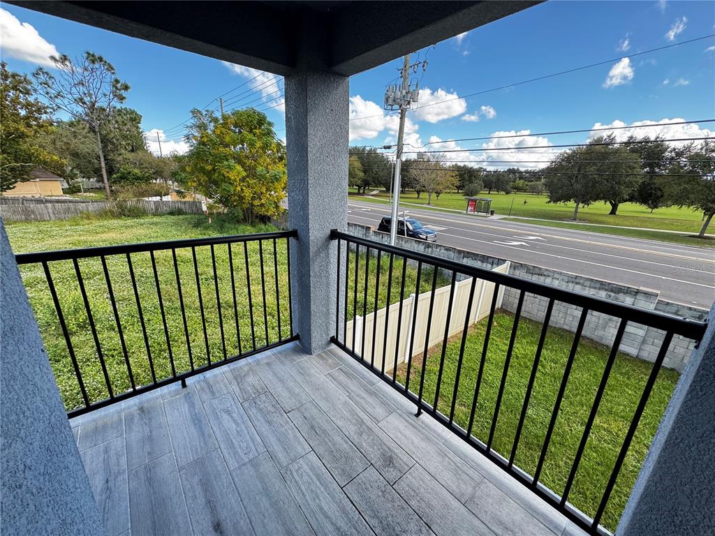 101 Grove Street Orlando, FL 32835 - Photo 38 of 57 a view of balcony with wooden floor