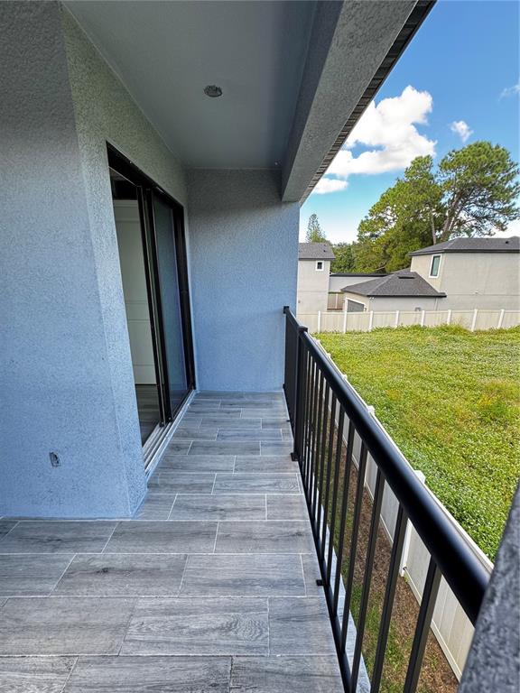 101 Grove Street Orlando, FL 32835 - Photo 40 of 57 a view of balcony with yard