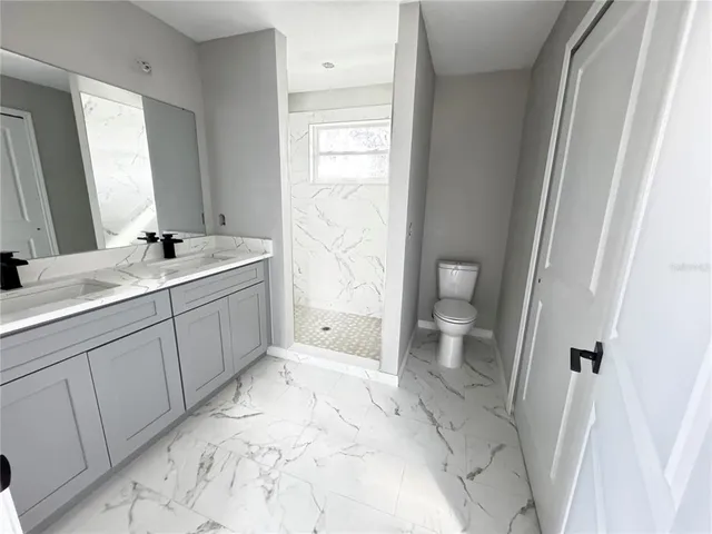 a view of room and a window