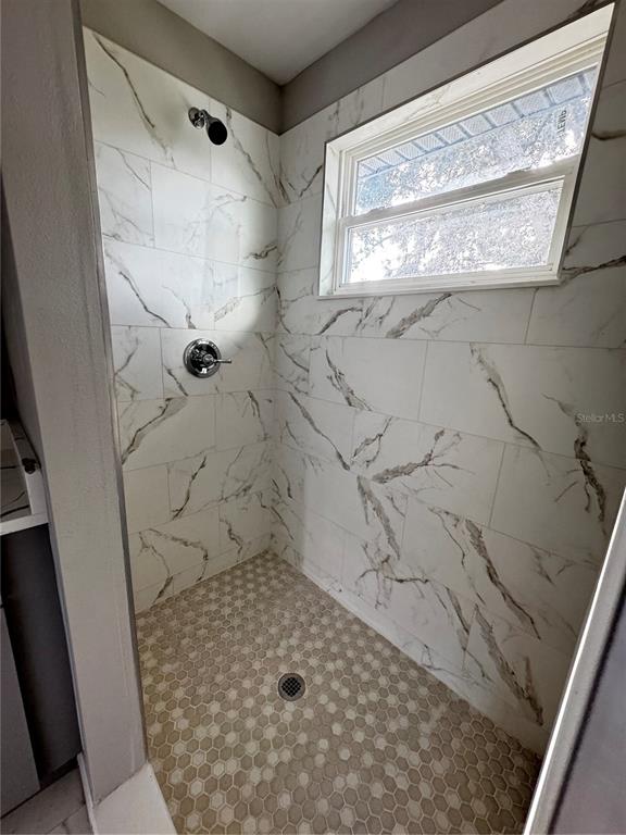 101 Grove Street Orlando, FL 32835 - Photo 49 of 57 a bathroom with a shower