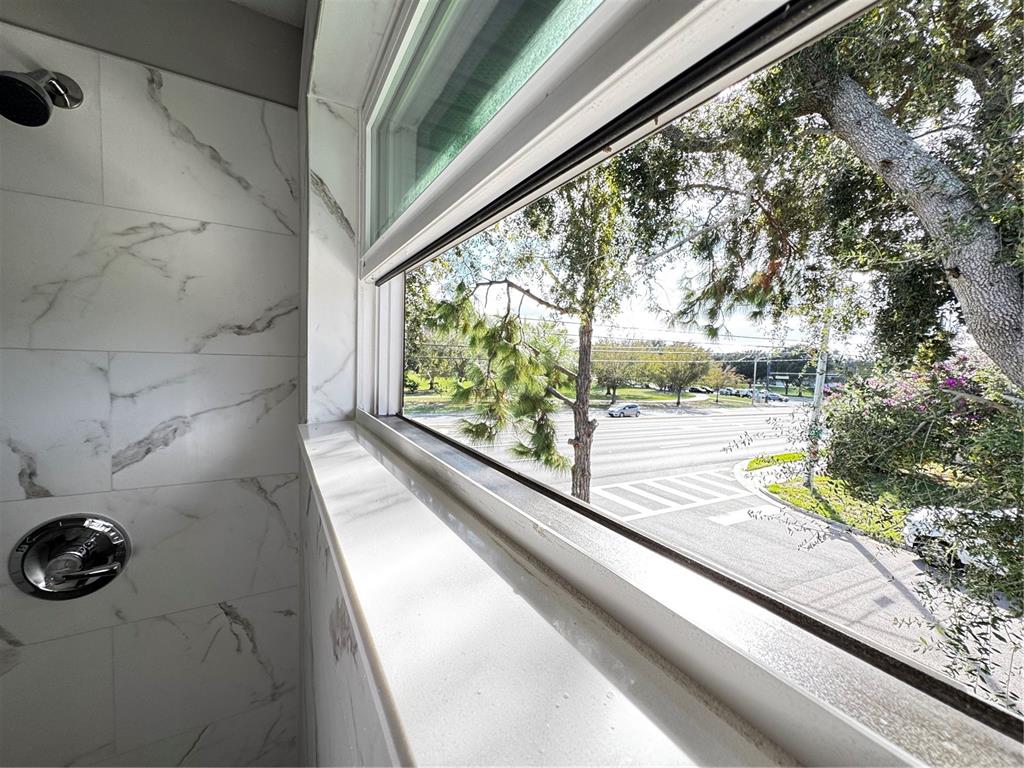 101 Grove Street Orlando, FL 32835 - Photo 50 of 57 a view of a balcony and car parked on the street