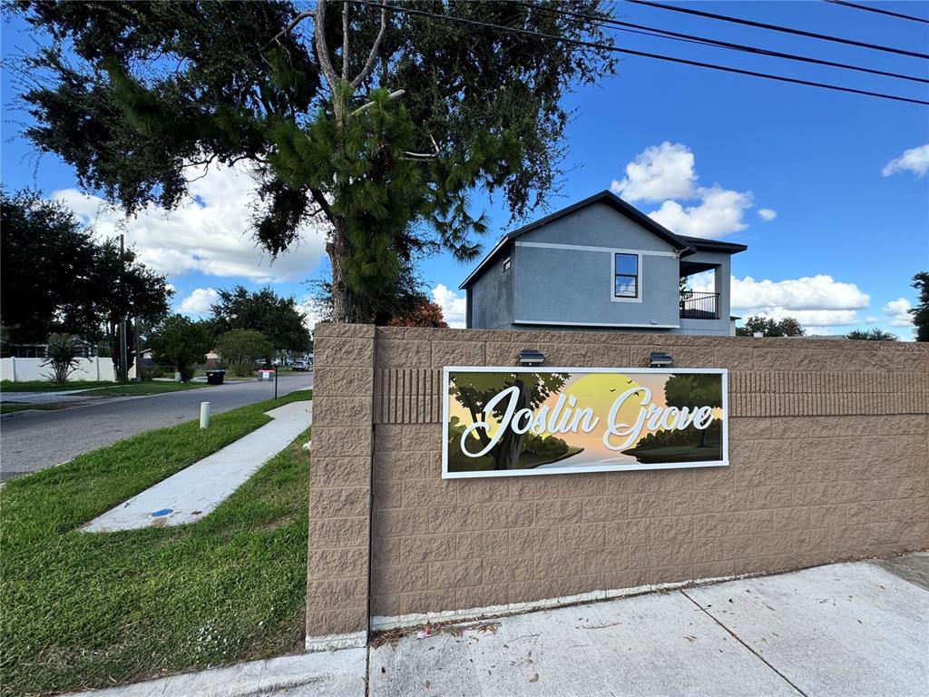 101 Grove Street Orlando, FL 32835 - Photo 9 of 57 a sign that is on the side of a building