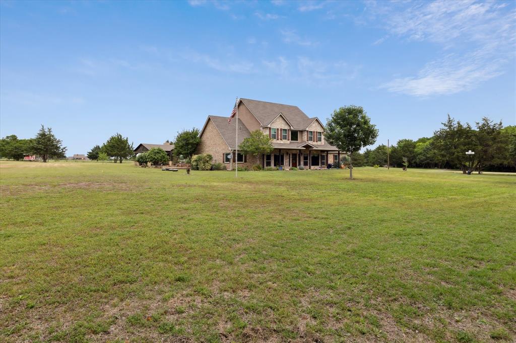 6251 Hayes Road Midlothian, TX 76065 - Photo 27 of 30 a view of a ocean with a building in the background