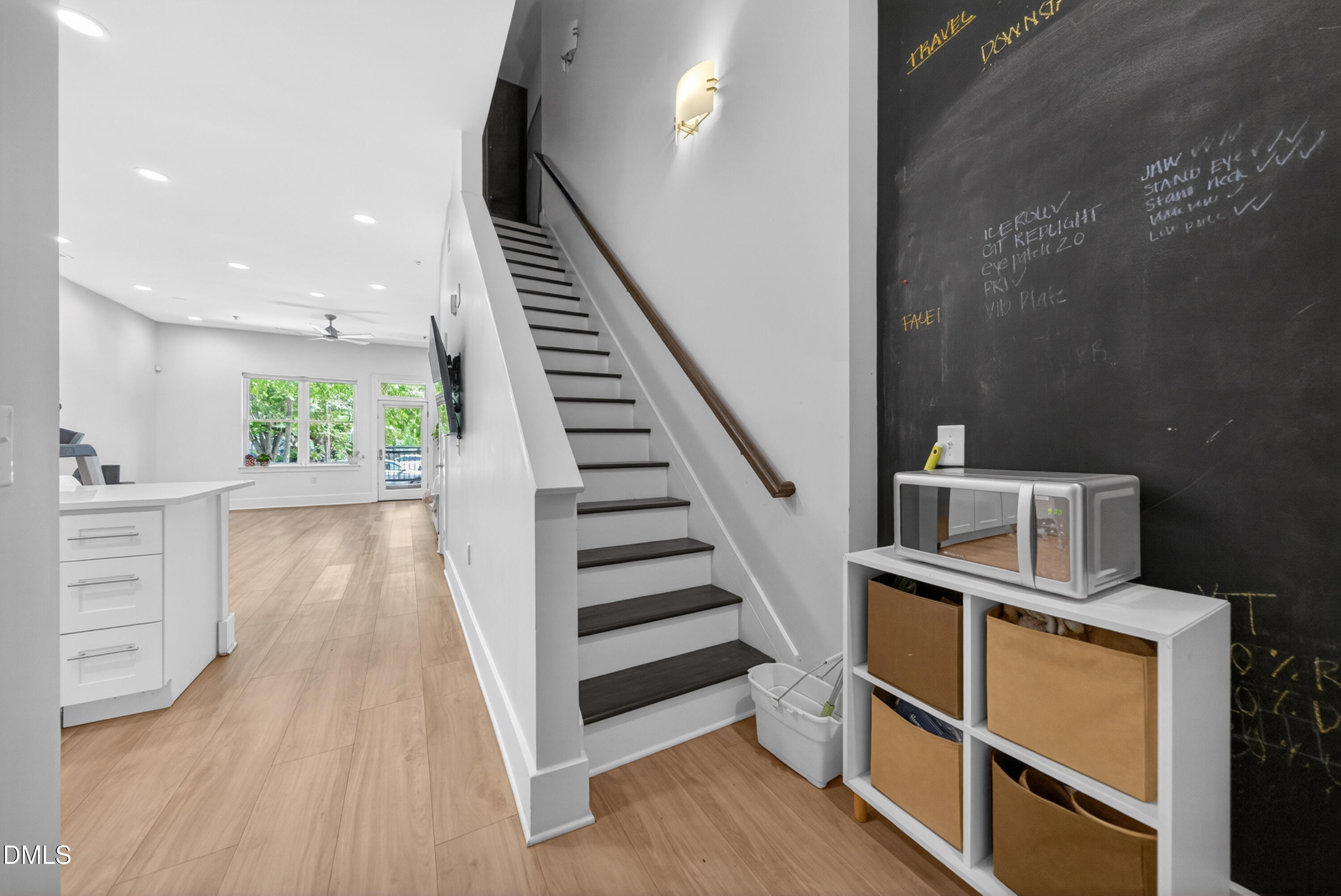 444 South Blount Street, Unit 111 Raleigh, NC 27601 - Photo 25 of 40 a view of entryway with wooden floor and stairs