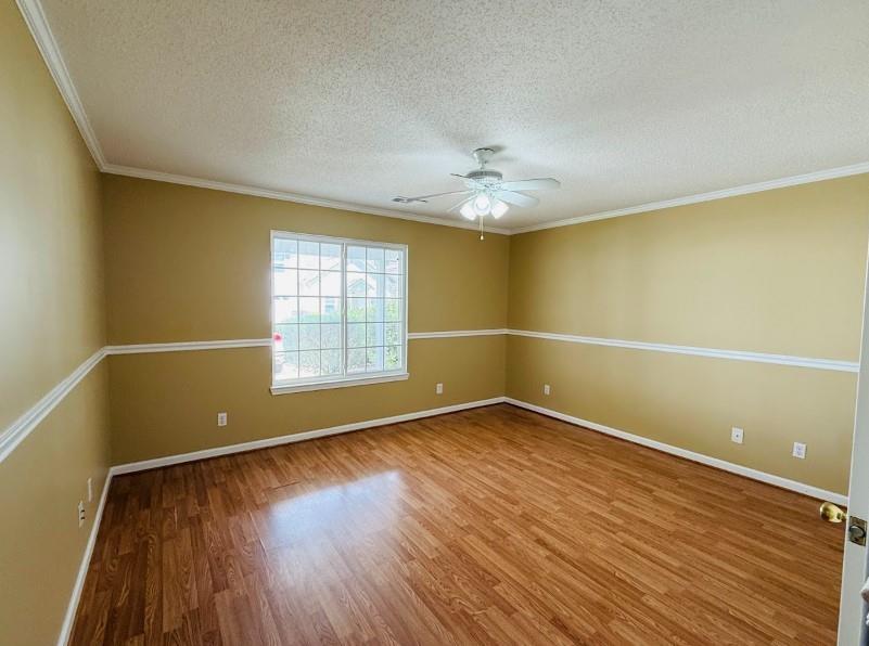 153 Crest Pointe Bremen, GA 30110 - Photo 16 of 20 a view of an empty room with wooden floor and a window
