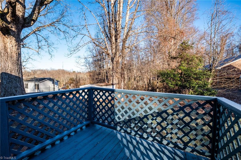 108 Reeves Lane Elkin, NC 28621 - Photo 18 of 20 Rear deck and view of back yard.