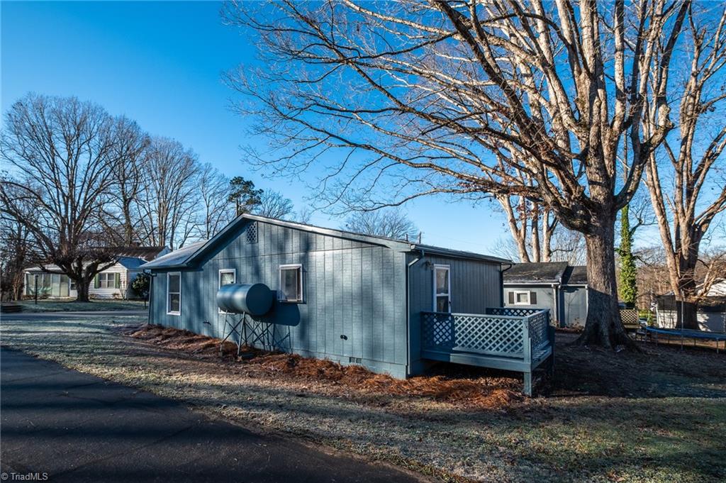 108 Reeves Lane Elkin, NC 28621 - Photo 4 of 20 Side and rear view of home with back deck.