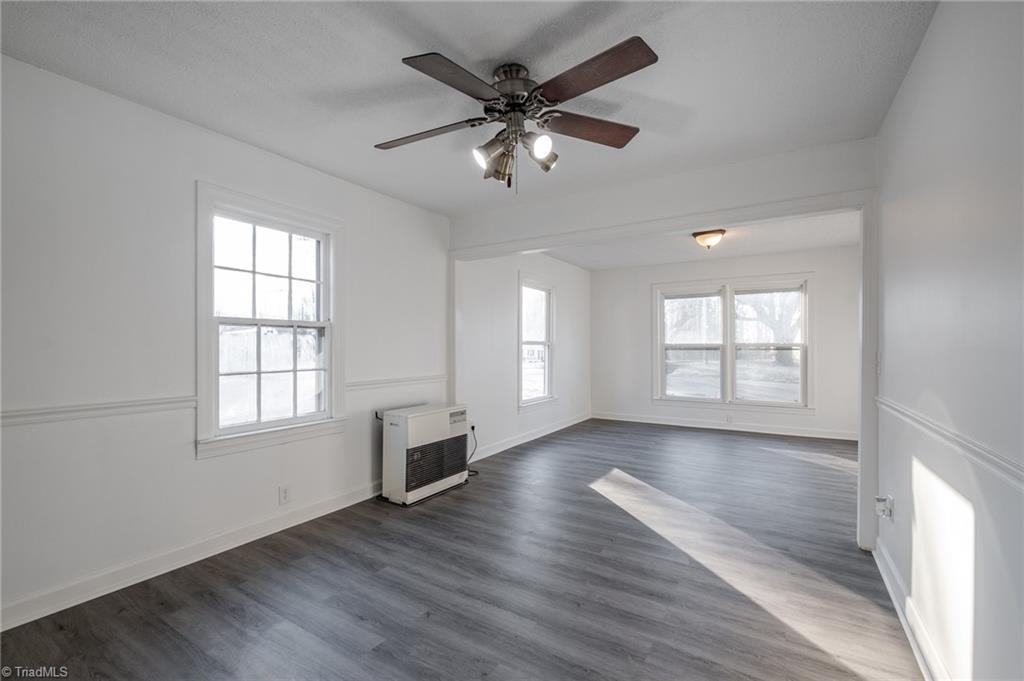 108 Reeves Lane Elkin, NC 28621 - Photo 7 of 20 Home features fresh coat of paint and waterproof vinyl flooring.