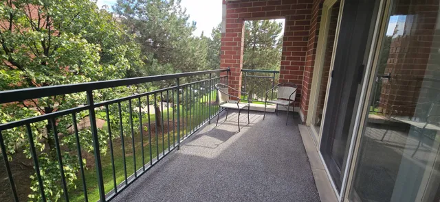 a view of balcony with furniture