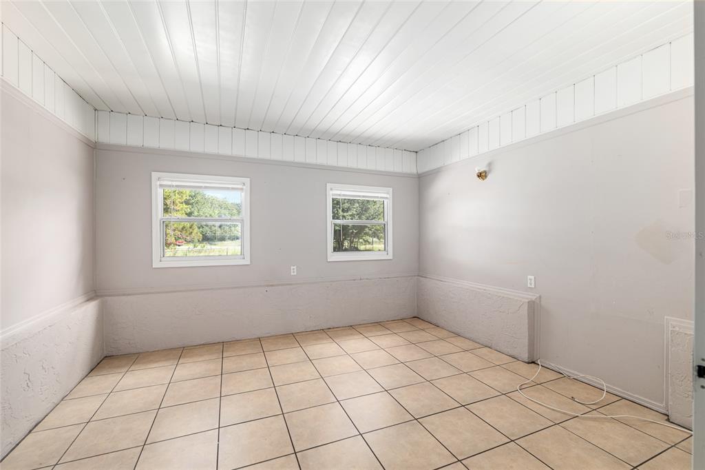 21 Pecan Course Circle Ocala, FL 34472 - Photo 13 of 46 an empty room with windows