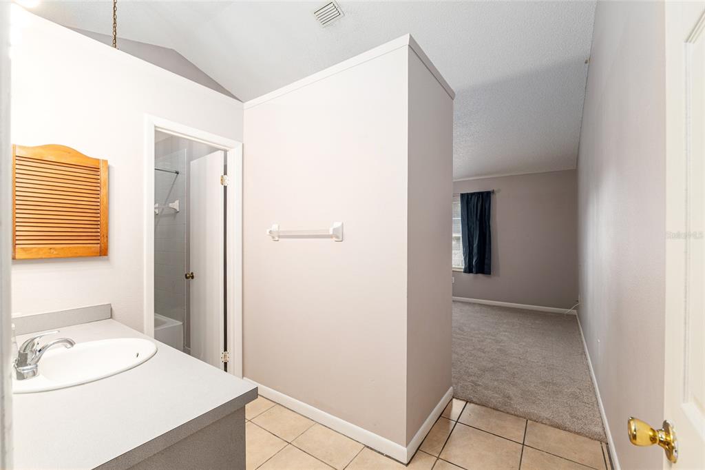 21 Pecan Course Circle Ocala, FL 34472 - Photo 21 of 46 a bathroom with a sink and a mirror