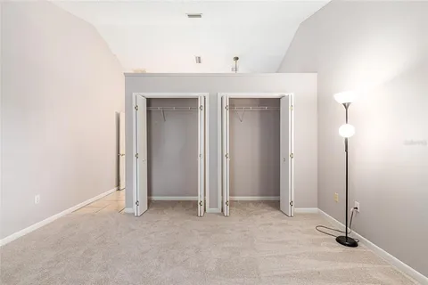 a bathroom with a sink a mirror and a shower