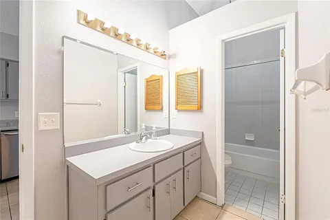 a bathroom with a shower and a toilet