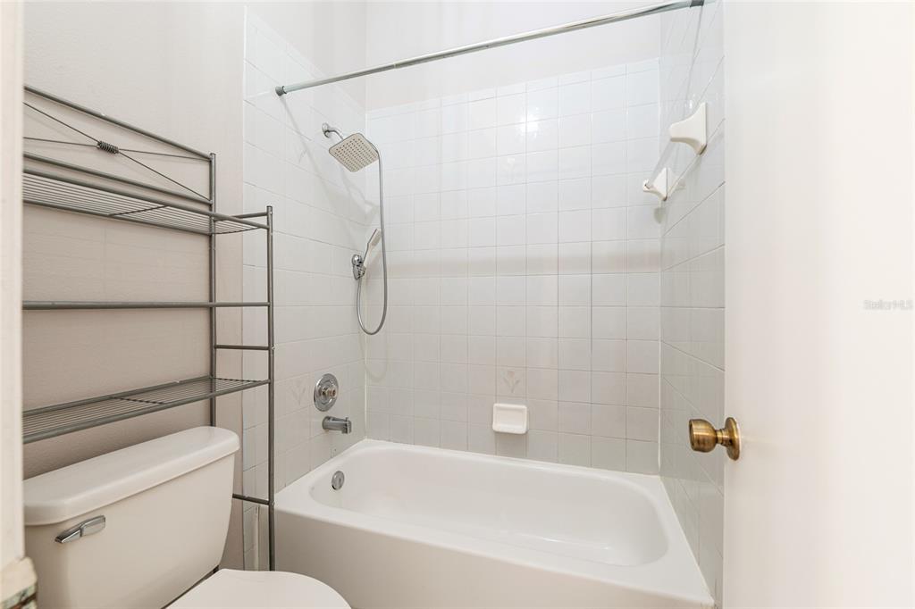 21 Pecan Course Circle Ocala, FL 34472 - Photo 26 of 46 a bathroom with a shower and a toilet