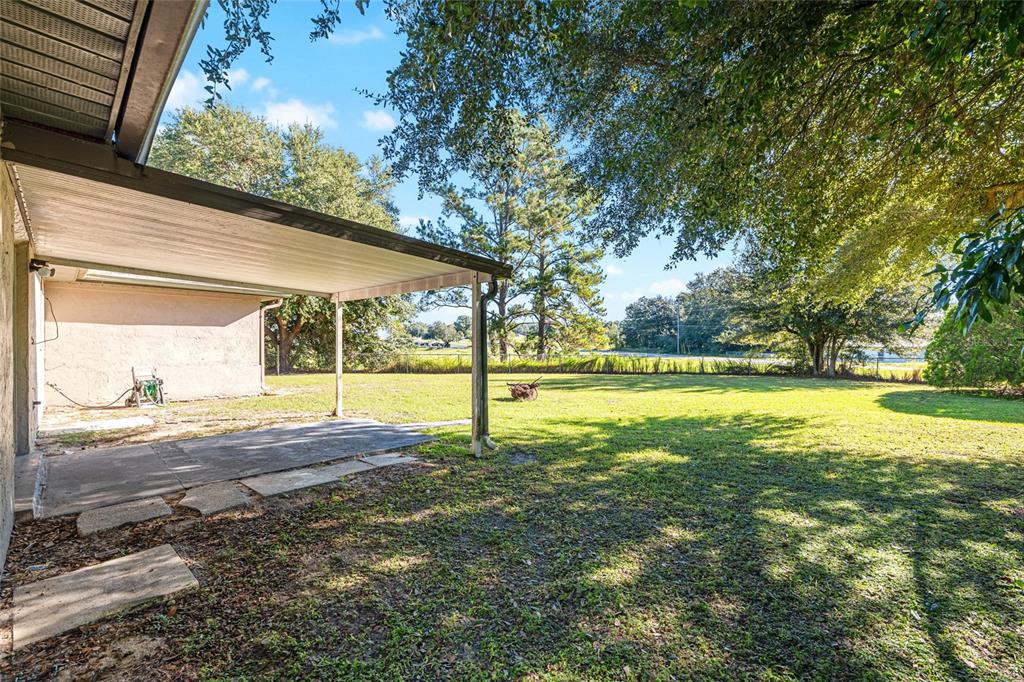 21 Pecan Course Circle Ocala, FL 34472 - Photo 40 of 46 a view of an house with a swimming pool