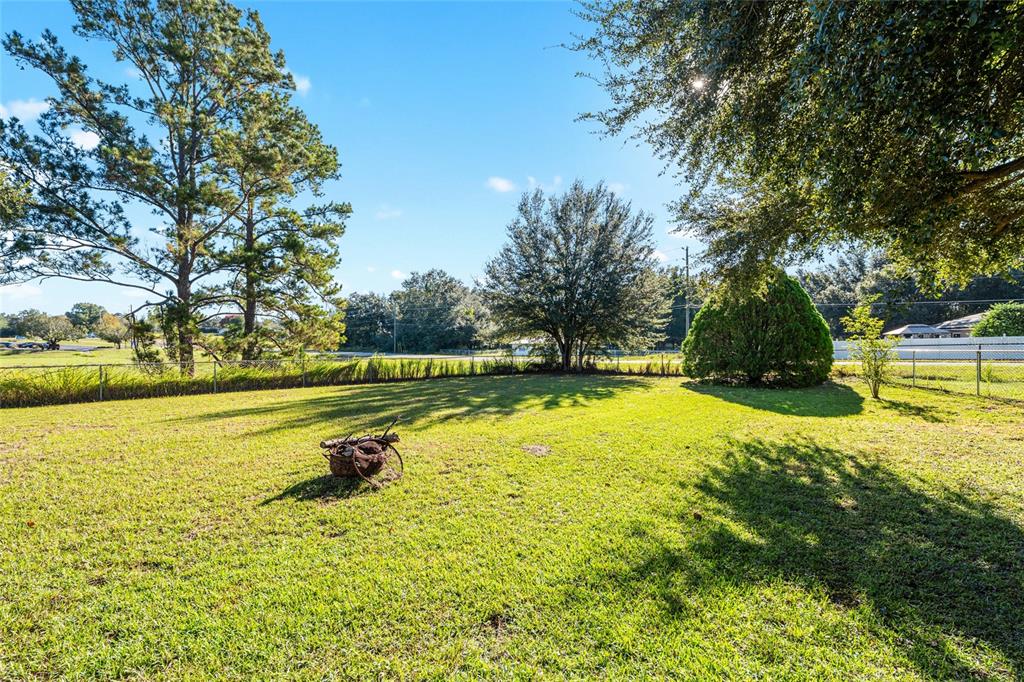 21 Pecan Course Circle Ocala, FL 34472 - Photo 41 of 46 a view of a swimming pool with an outdoor space and seating area