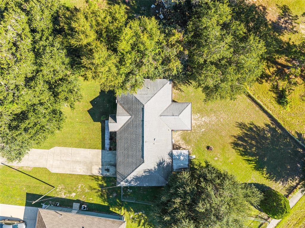 21 Pecan Course Circle Ocala, FL 34472 - Photo 46 of 46 a view of a house with a yard