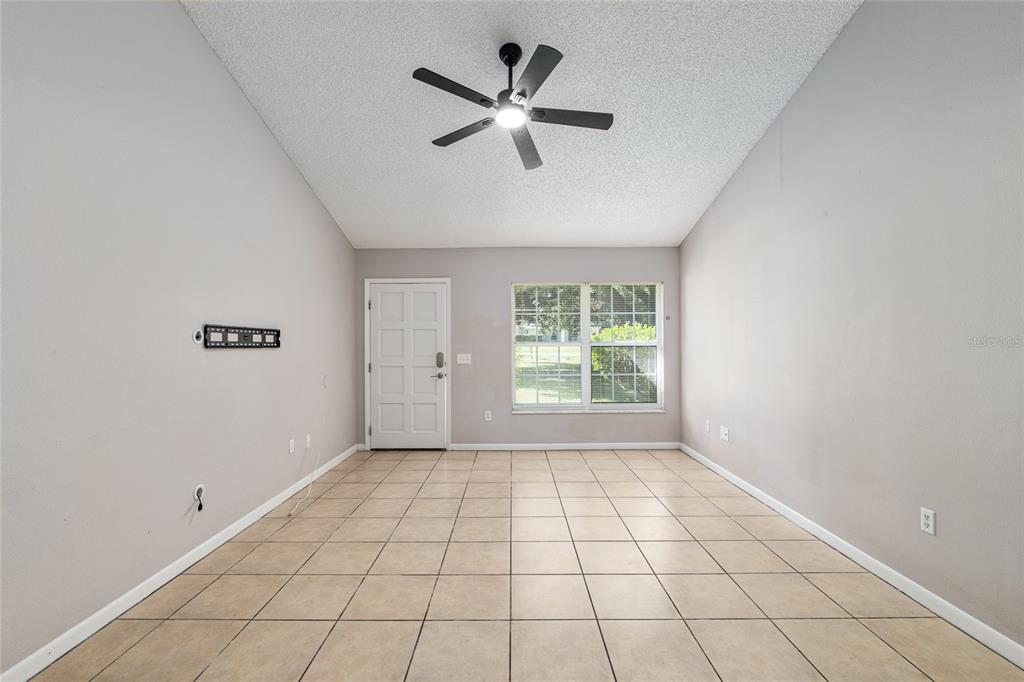 21 Pecan Course Circle Ocala, FL 34472 - Photo 8 of 46 a view of an empty room with a window