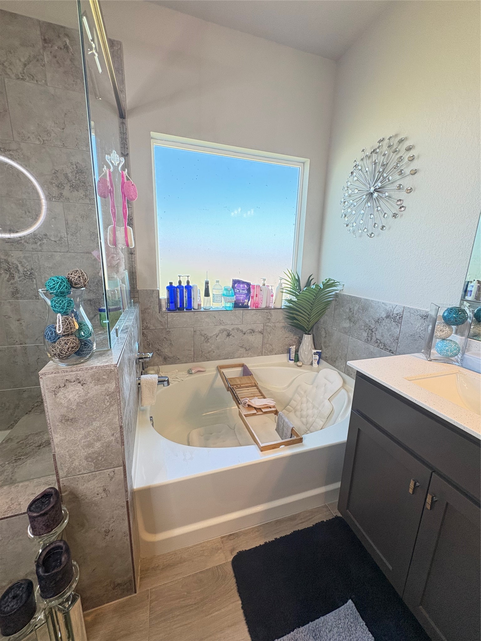 1239 Marvista Lane Rosharon, TX 77583 - Photo 21 of 50 a bathroom with a granite countertop sink a mirror and bathtub