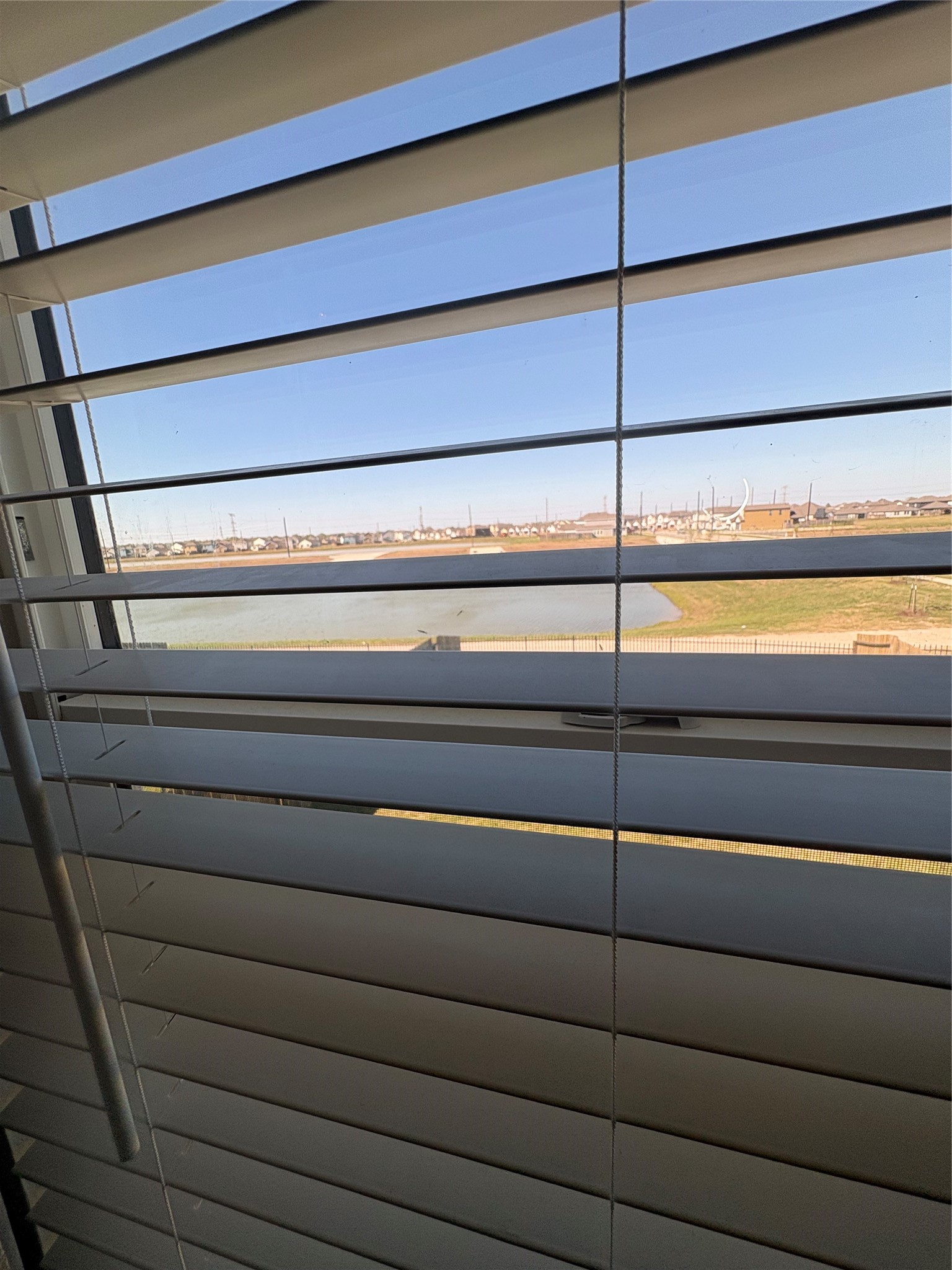 1239 Marvista Lane Rosharon, TX 77583 - Photo 25 of 50 a view of a room with racks on the wall