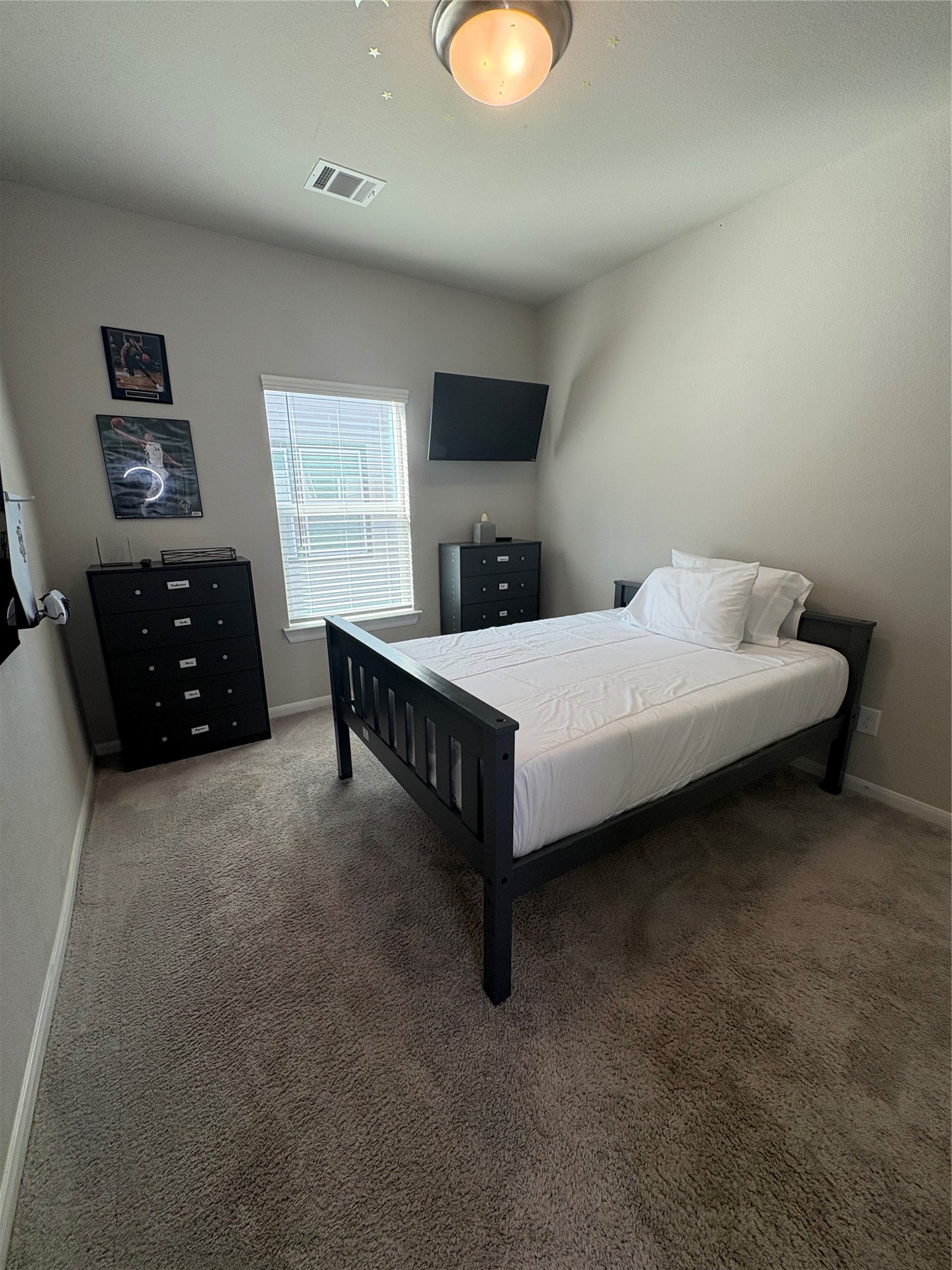 1239 Marvista Lane Rosharon, TX 77583 - Photo 29 of 50 a bedroom with a bed and window