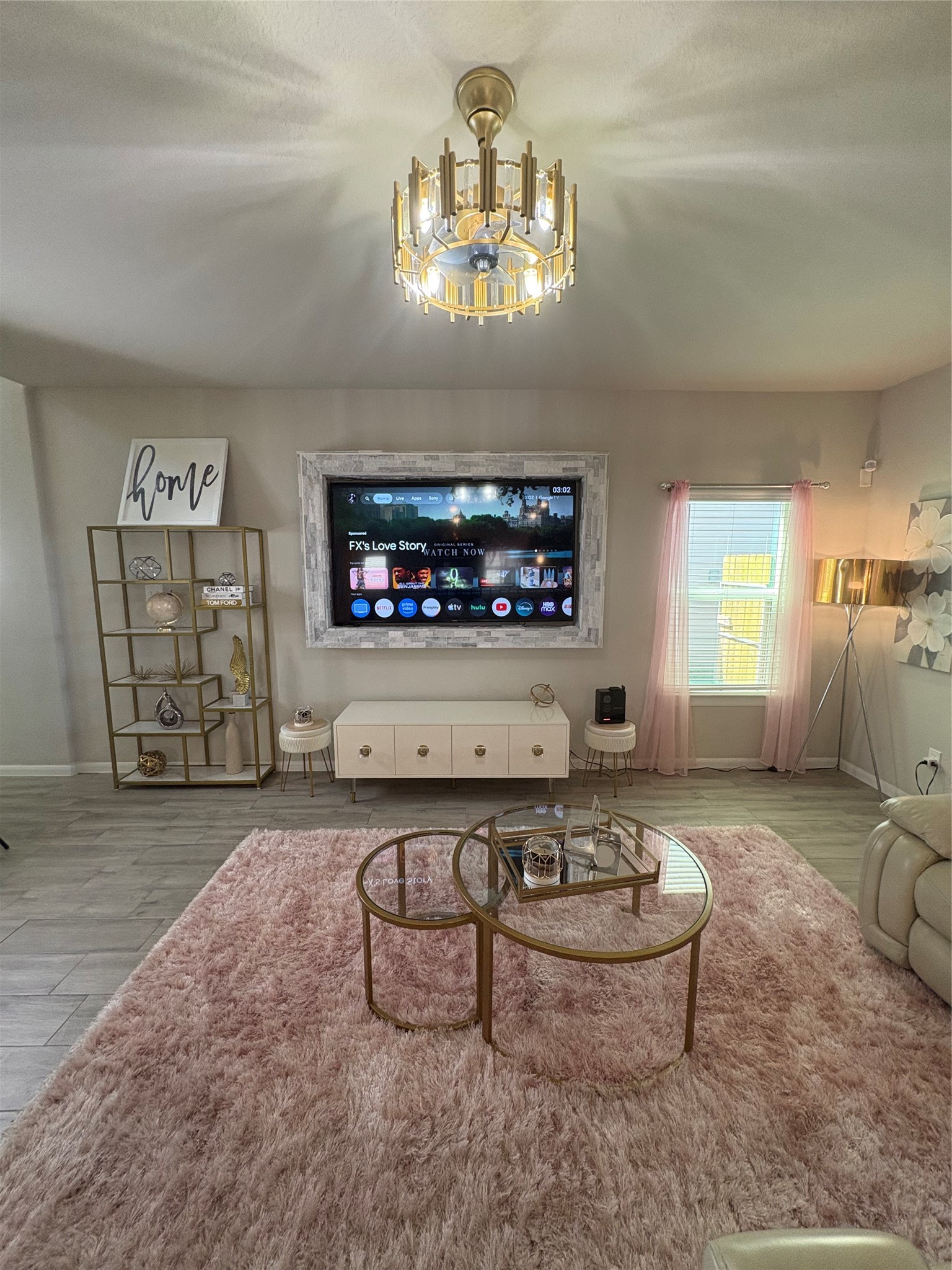 1239 Marvista Lane Rosharon, TX 77583 - Photo 6 of 50 a living room with furniture and a chandelier