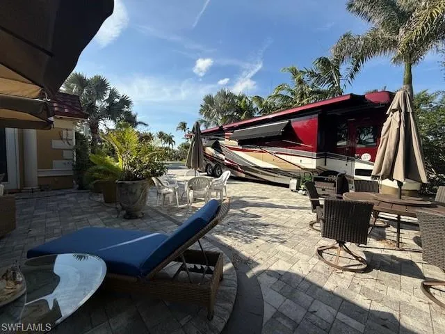 $699,000 | 4840 Carriage Court, Naples, FL 34114