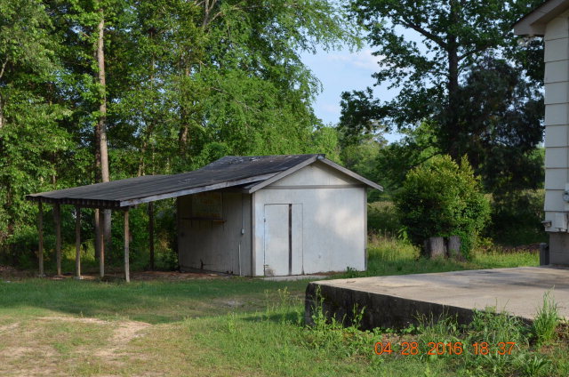 4684 Fulton Mill Road Macon, GA 31216 - Photo 15 of 16 a view of backyard of house with green space