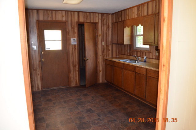 4684 Fulton Mill Road Macon, GA 31216 - Photo 5 of 16 a view of a kitchen with a sink