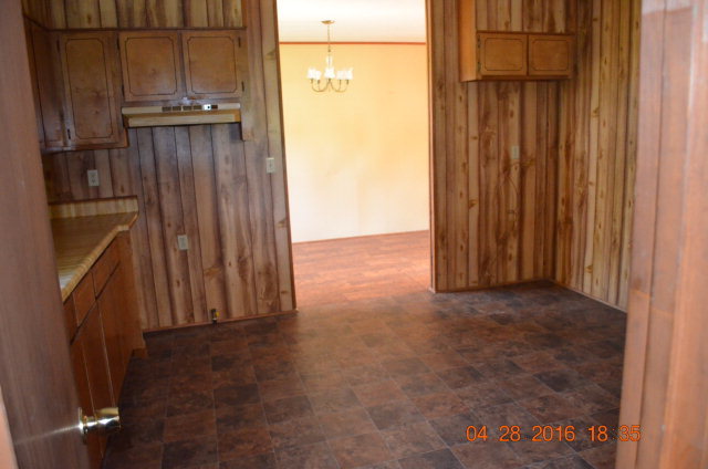 4684 Fulton Mill Road Macon, GA 31216 - Photo 7 of 16 an empty room with wooden door