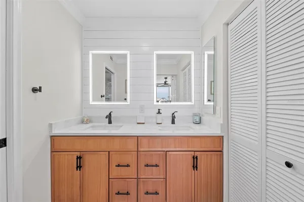 a bathroom with a shower and a tub