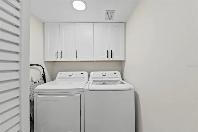 a view of a pathway both side of grassy field with shrub