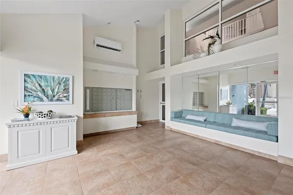 a view of a swimming pool with an outdoor seating