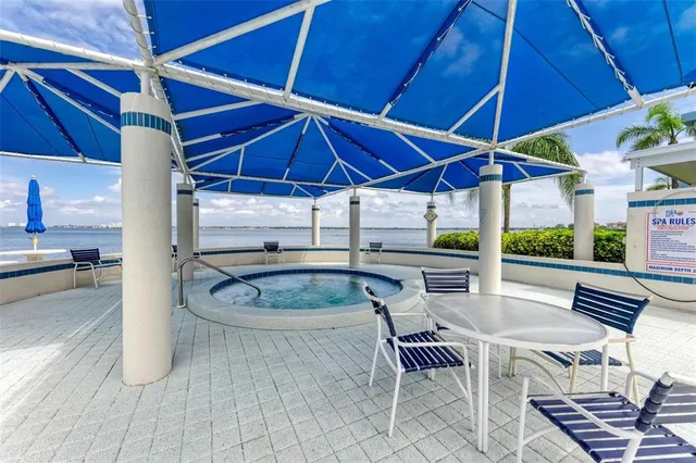 a view of a lake with a large building in the background