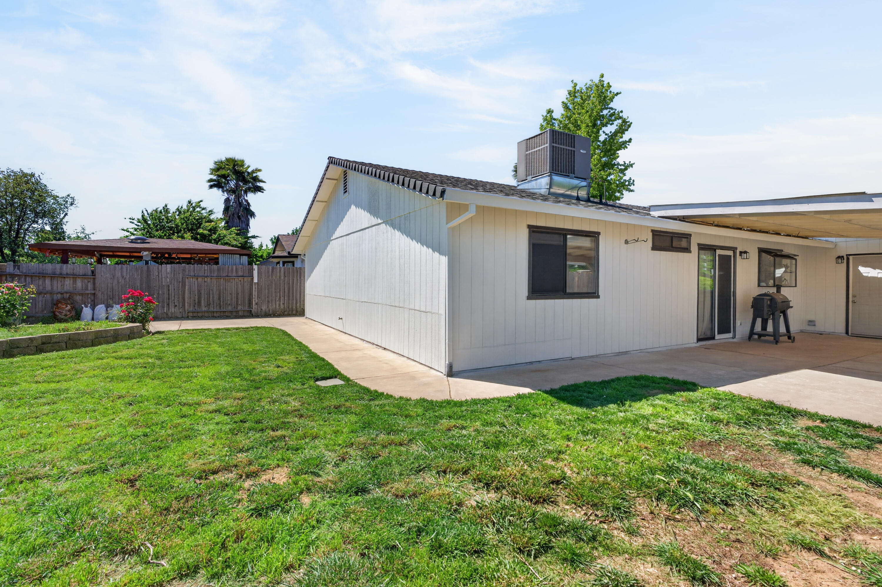3733 Capricorn Way Redding, CA 96002 - Photo 20 of 22 a view of house with backyard