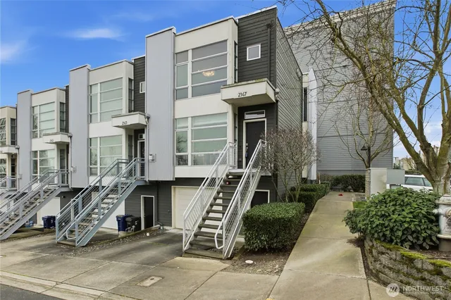 a front view of a building with many windows