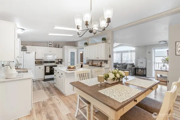 a view of a dining room kitchen and a sink
