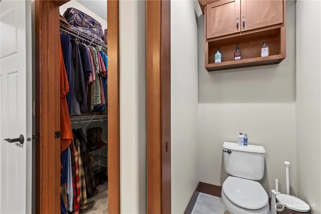 a bathroom with a toilet and a sink