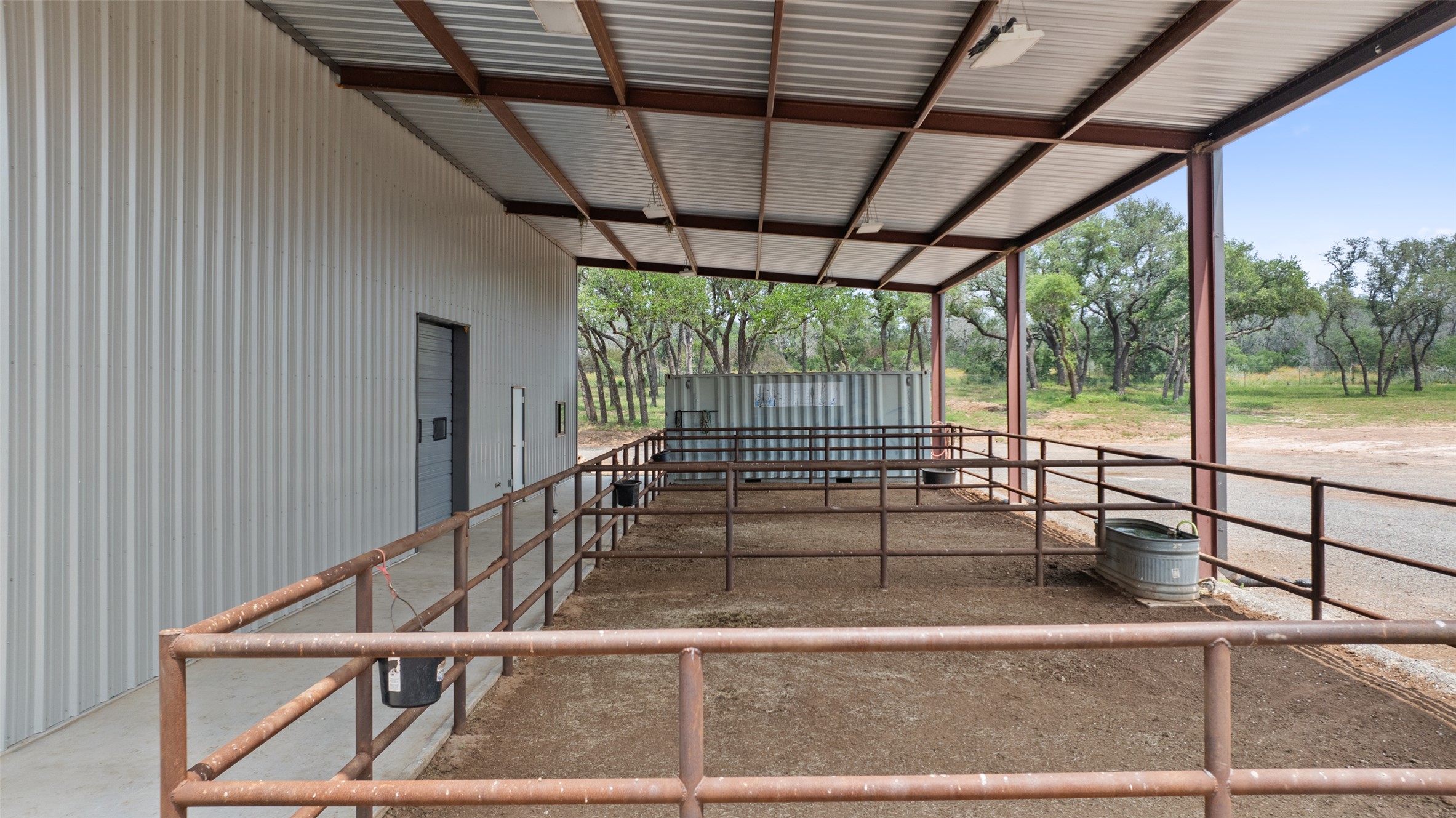 3431 Klett Ranch Road Johnson City, TX 78636 - Photo 25 of 33 Horse barn featuring view of scattered trees